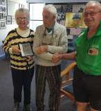 Presenting Charlie and Margaret Earp with a plaque and gift and Charlie a  lifetime memmembership