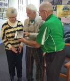 Presenting Charlie and Margaret Earp with a plaque and gift and Charlie a  lifetime memmembership